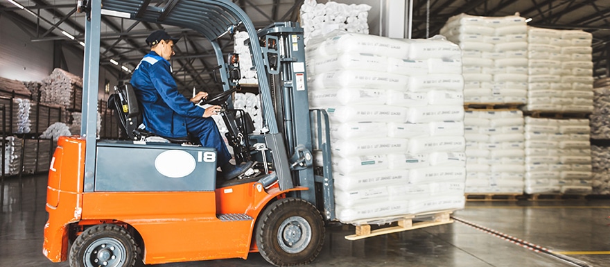 man operating forklift