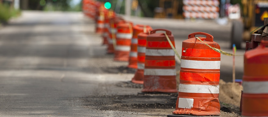 Construction barrels on road